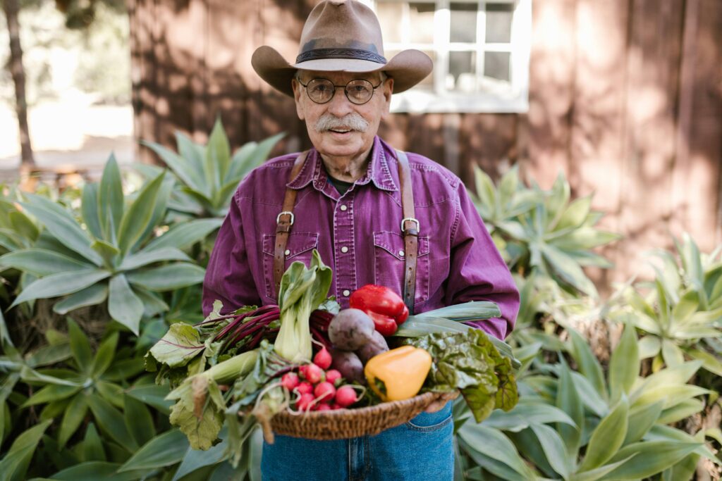 older adult engaged in gardening  