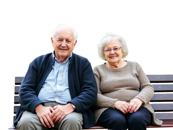 Senior man and woman in US sitting on a bench in park
