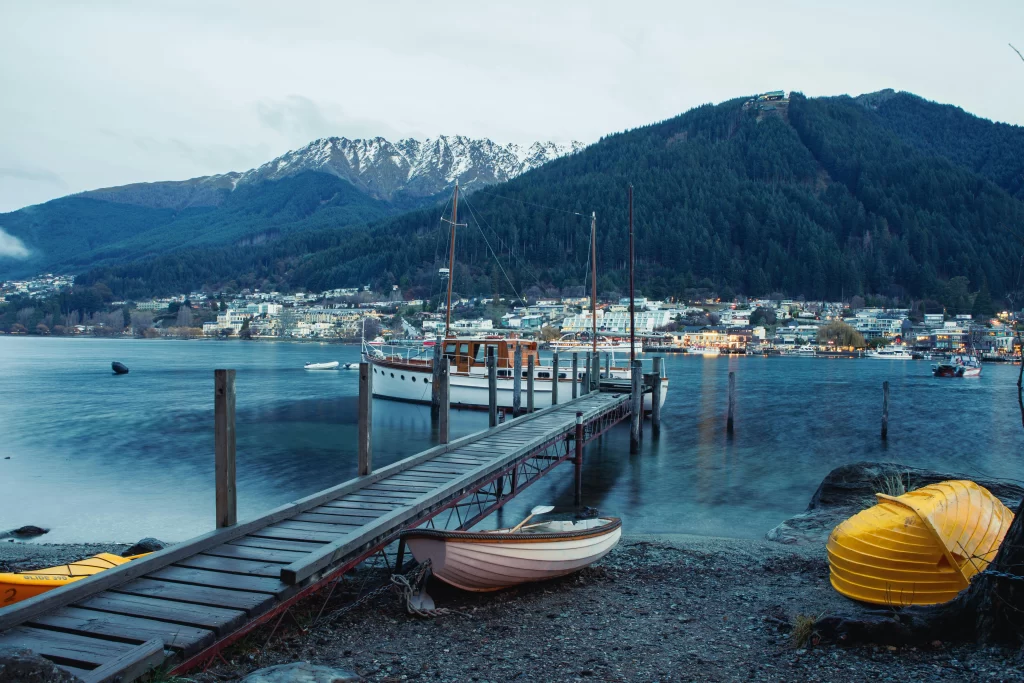 Brown Wooden Dock on Seashore, Queenstown, New Zealand.